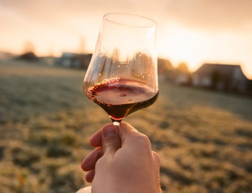 long-stem wine glass filled with liquid